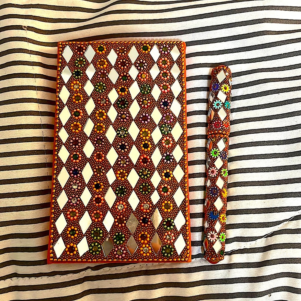 Beautiful design notepad and a pen